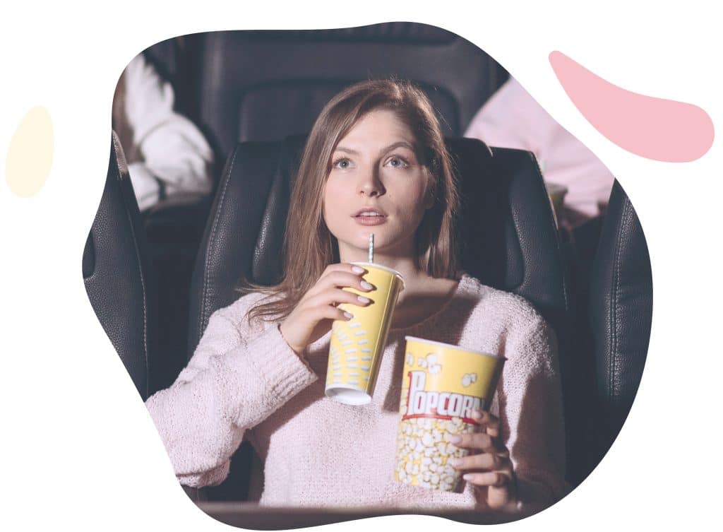 girl experiencing intense emotions from watching a scary movie